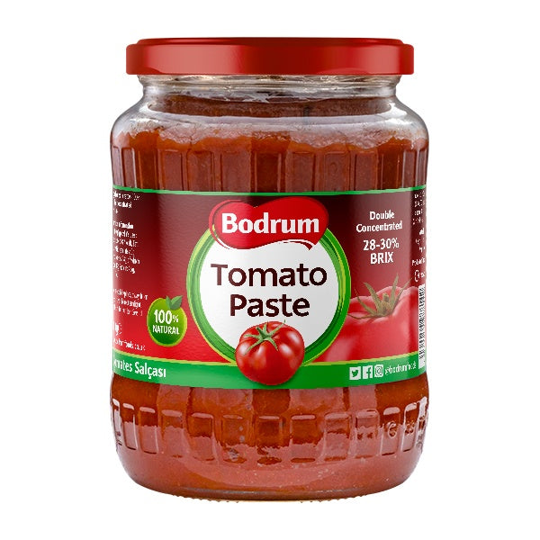 Jar of Bodrum Tomato Paste with a red lid on a white background