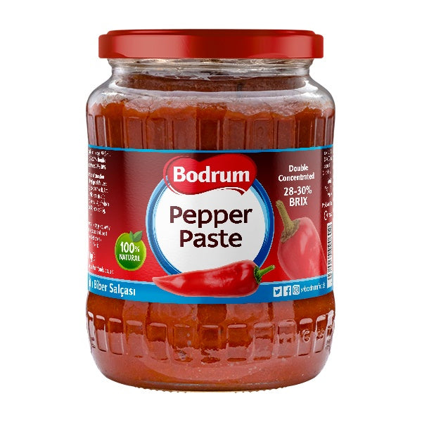Jar of Bodrum Pepper Paste with a red lid on a white background