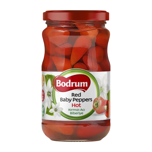 Jar of Bodrum red baby peppers on a white background