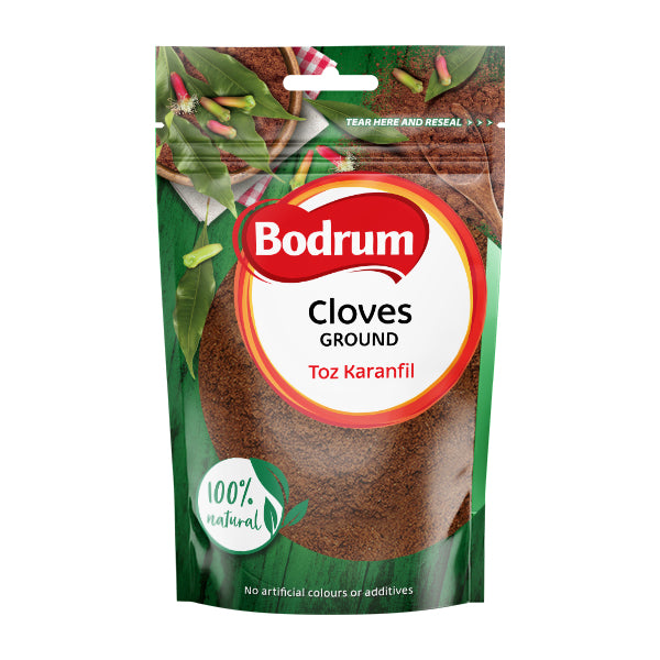 Packaging of Bodrum ground cloves with green leaves on a white background
