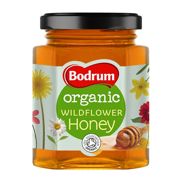 Jar of Bodrum organic wildflower honey on a white background