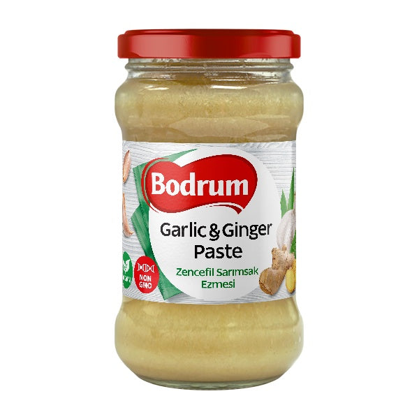 Jar of Bodrum Garlic & Ginger Paste with a red lid on a white background