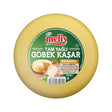 Round cheese wheel with 'Melis' label on a white background