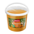 Bucket of Bodrum turmeric powder on a white background