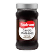 Jar of Bodrum Carob Molasses on a white background