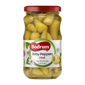 Jar of Bodrum baby peppers with a red lid on a white background