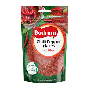 Packaging of Bodrum Chilli Pepper Flakes with red chili peppers on a white background