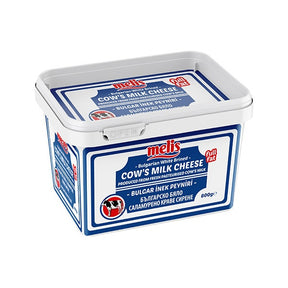 Bucket of melis cow's milk cheese on a white background