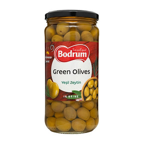 Jar of Bodrum green olives on a white background
