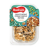 Packaged hand cracked Chilean walnut kernels with Bodrum branding on a white background
