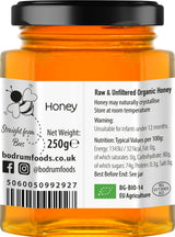 Honey jar with label showing brand information and product details