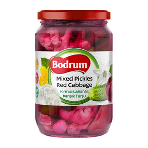 Jar of Bodrum mixed pickles with red cabbage on a white background