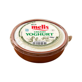Container of melis creamy yoghurt on a white background