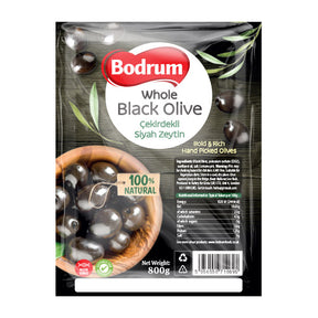 Packaging of Bodrum Whole Black Olives with a bowl of olives on a white background
