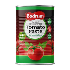 Can of Bodrum tomato paste with tomato graphics on a white background
