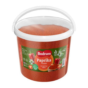 Bucket of Bodrum Paprika powder on a white background