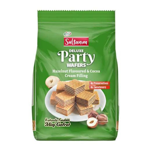 A green bag of Sultanm Deluxe Party Wafers Hazelnut Flavoured & Cocoa Cream Filling, featuring a photo of stacked wafers on a white plate with hazelnuts, set against a plain white background.