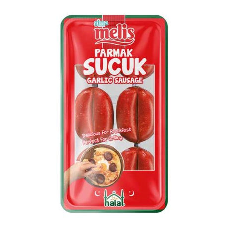 A package of Melis Parmak Sucuk Garlic Sausage, featuring a bright red packaging card with a green border, showing two sausages and a small image of a hand holding a slice.