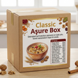Box labeled 'Classic Aşkre Box' with ingredients on a wooden surface